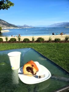 Relaxing by Okanagan Lake in Penticton with coffee and a delicious cake