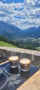 Beautiful view from Norquay lookout in Banff, captured from our campervan with freshly made coffee