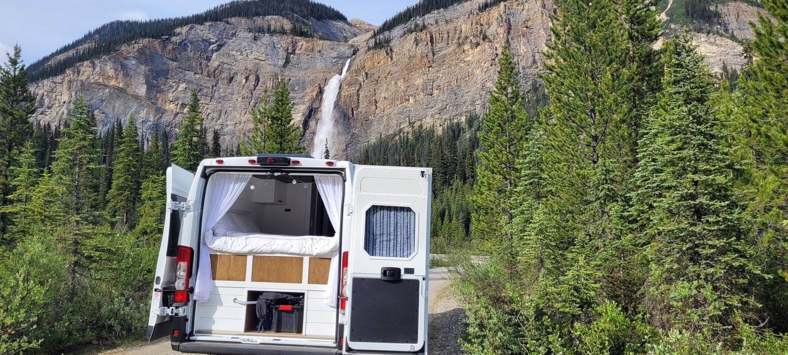 Stylux campervan with bed at Takakkaw Falls in Yoho National Park